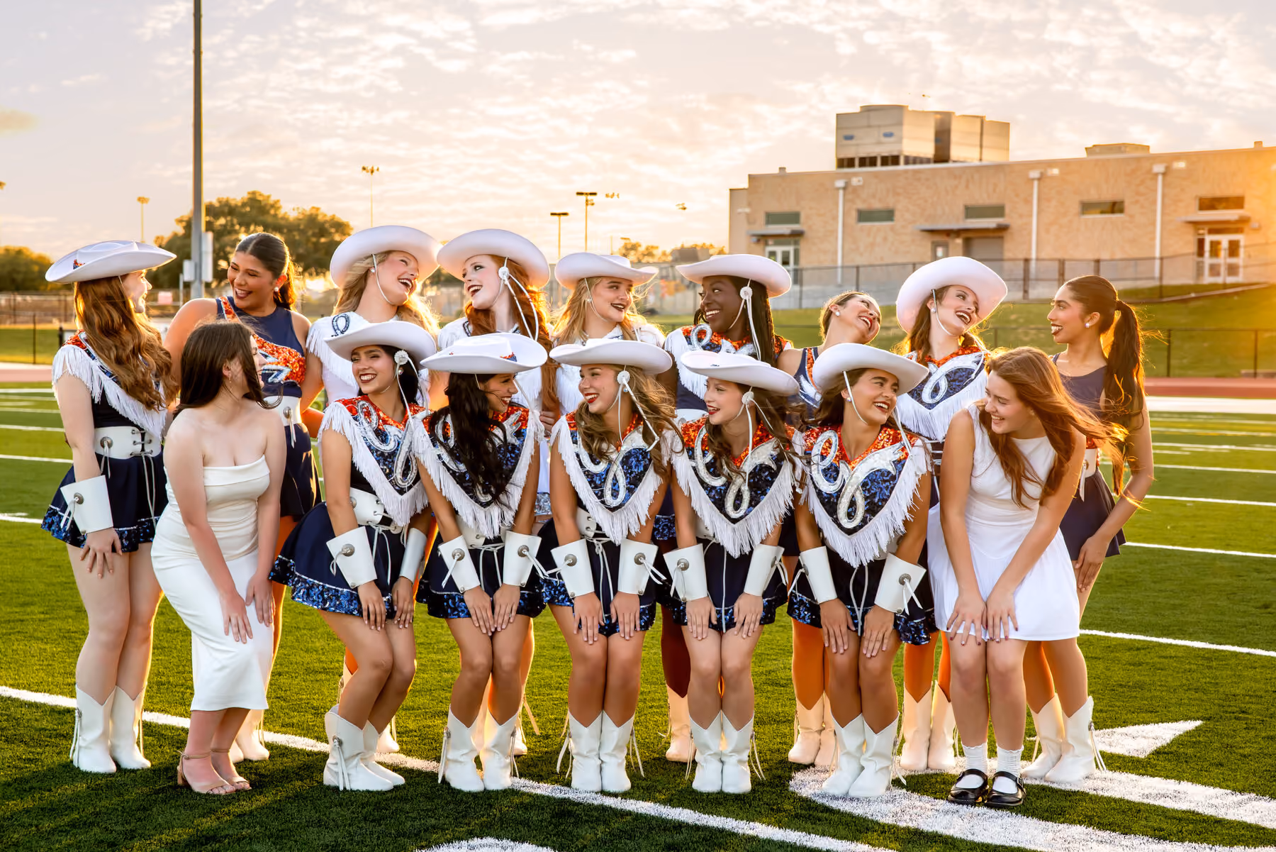 Guardians and Angels dancers together at sunset
