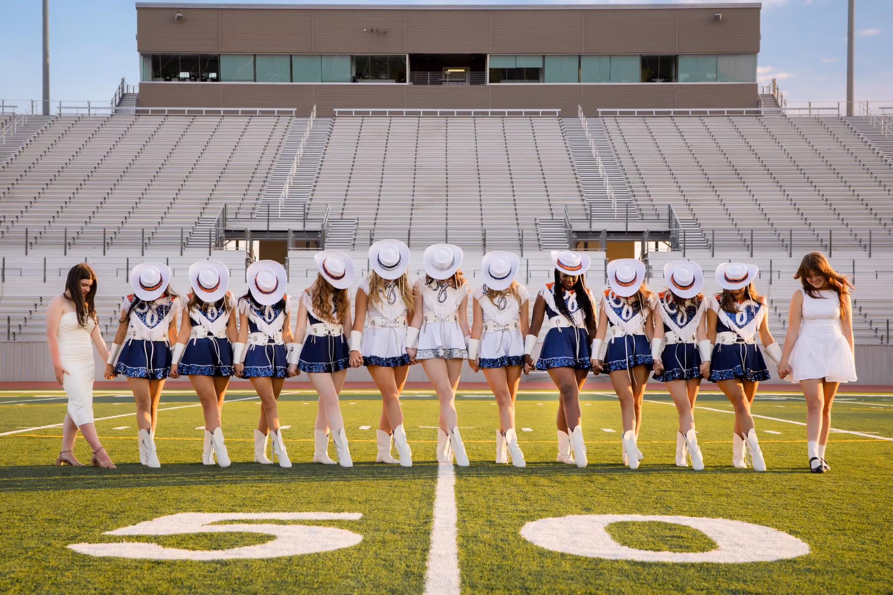 The kick line on the fifty yard line