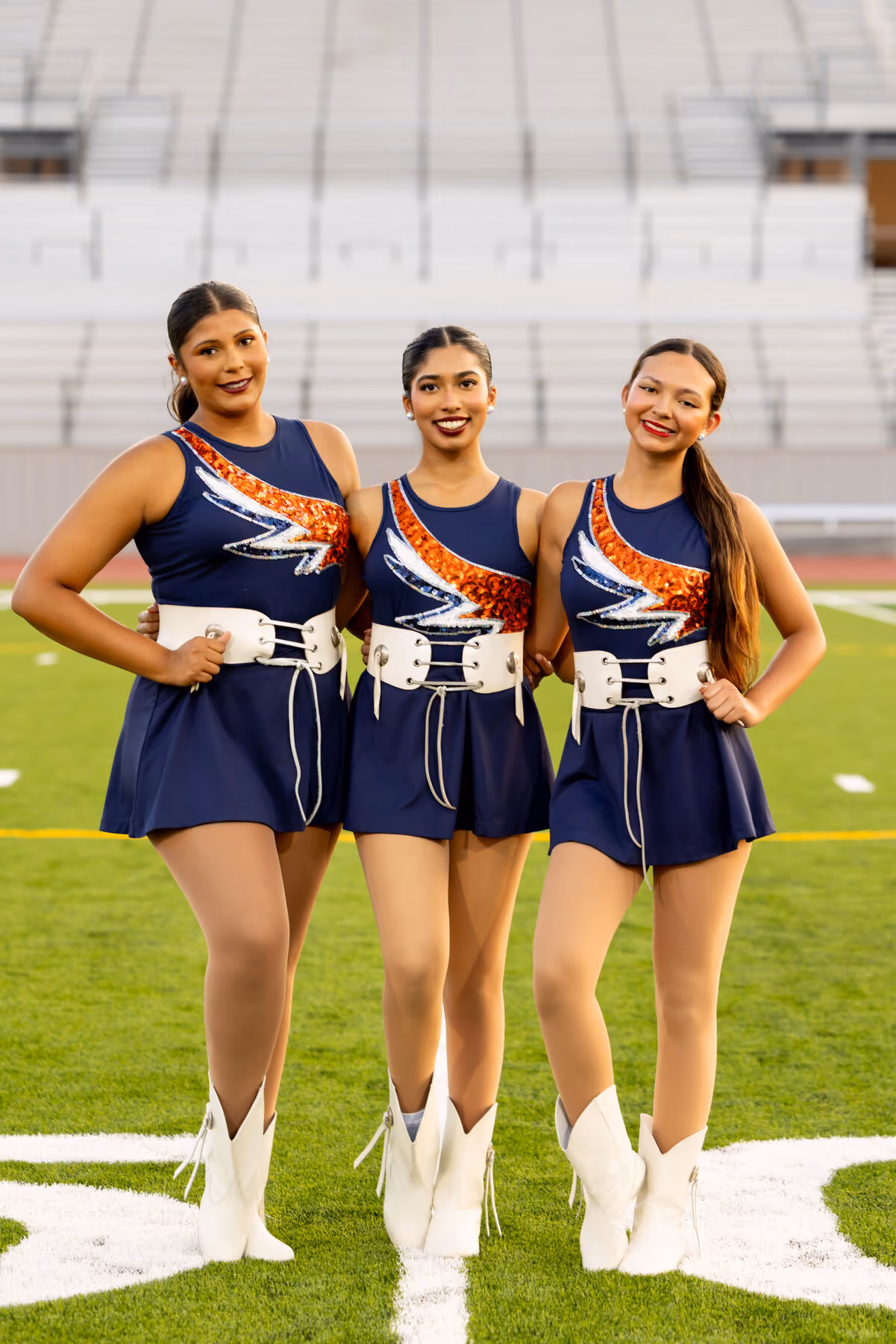Three Angels dancers on the field