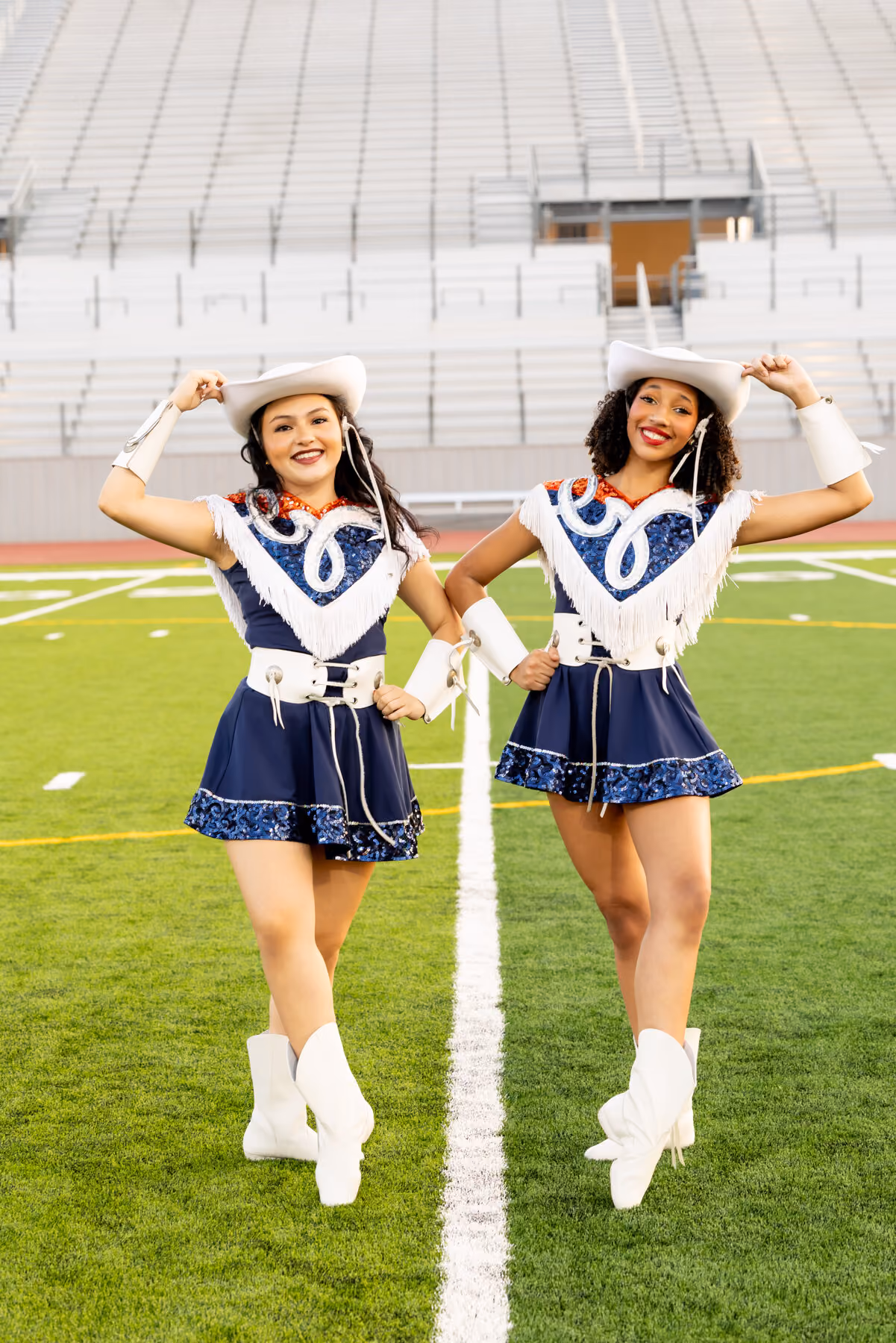 Two Guardians dancers on the field