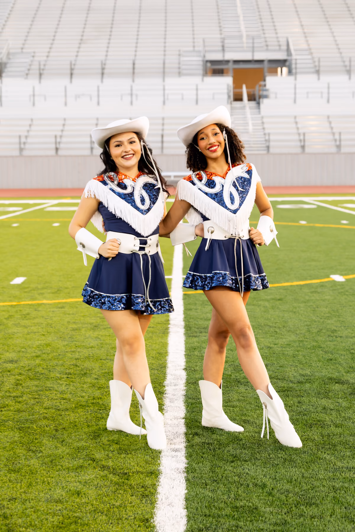 Two Guardians dancers on the field