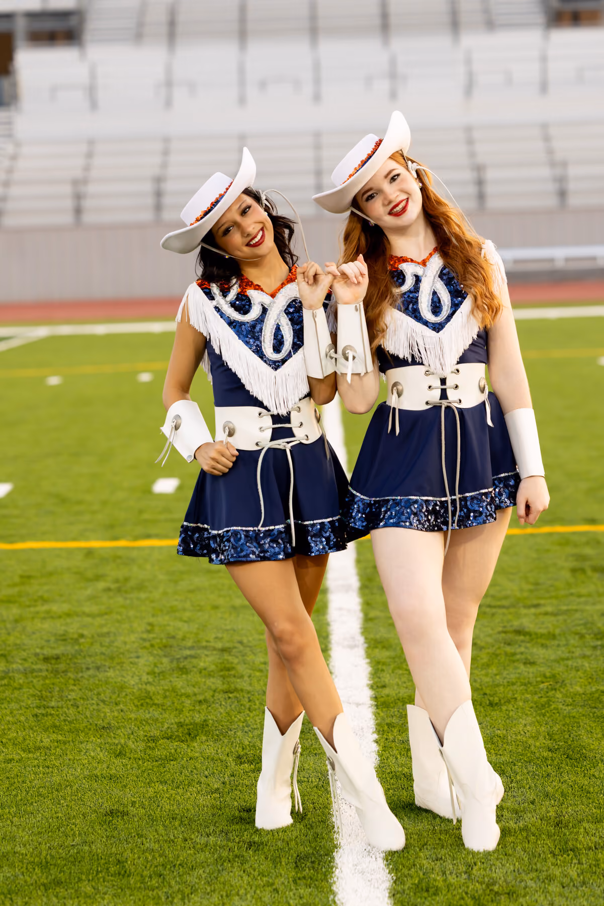 Two Guardians dancers on the field